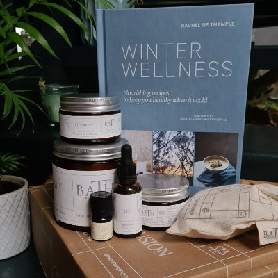 winter wellness cookery book atop of the limited edition winter wellness bath in a box by the bath project
